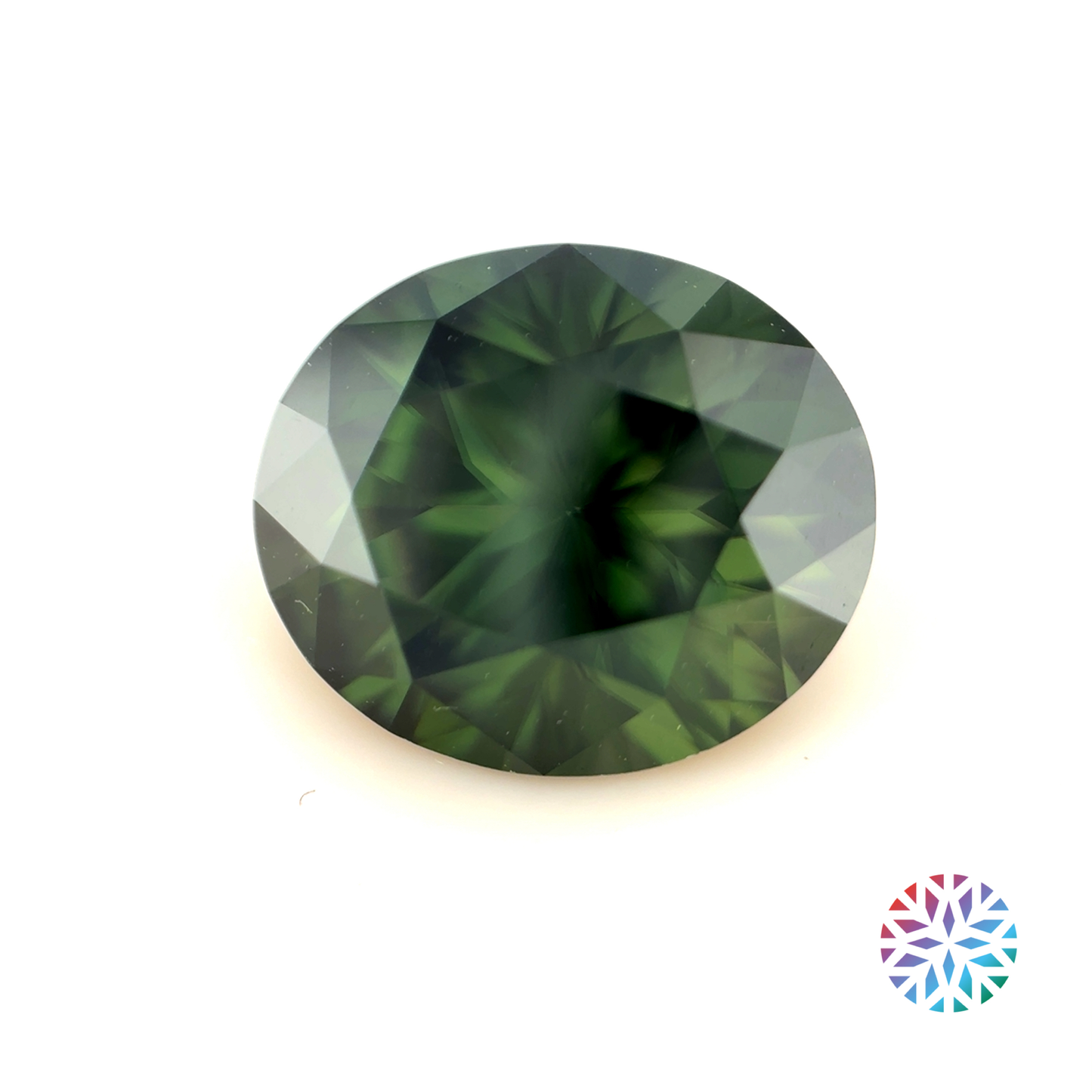 Green Zircon- Oval, 6.09ct, 11.1 x 9.5 x 6.4mm