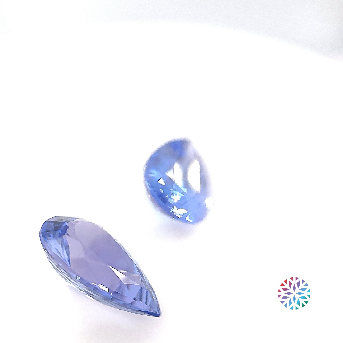 Lilac Tanzanite pair - Pear, 5.11ct, 11.5 x 7.6mm