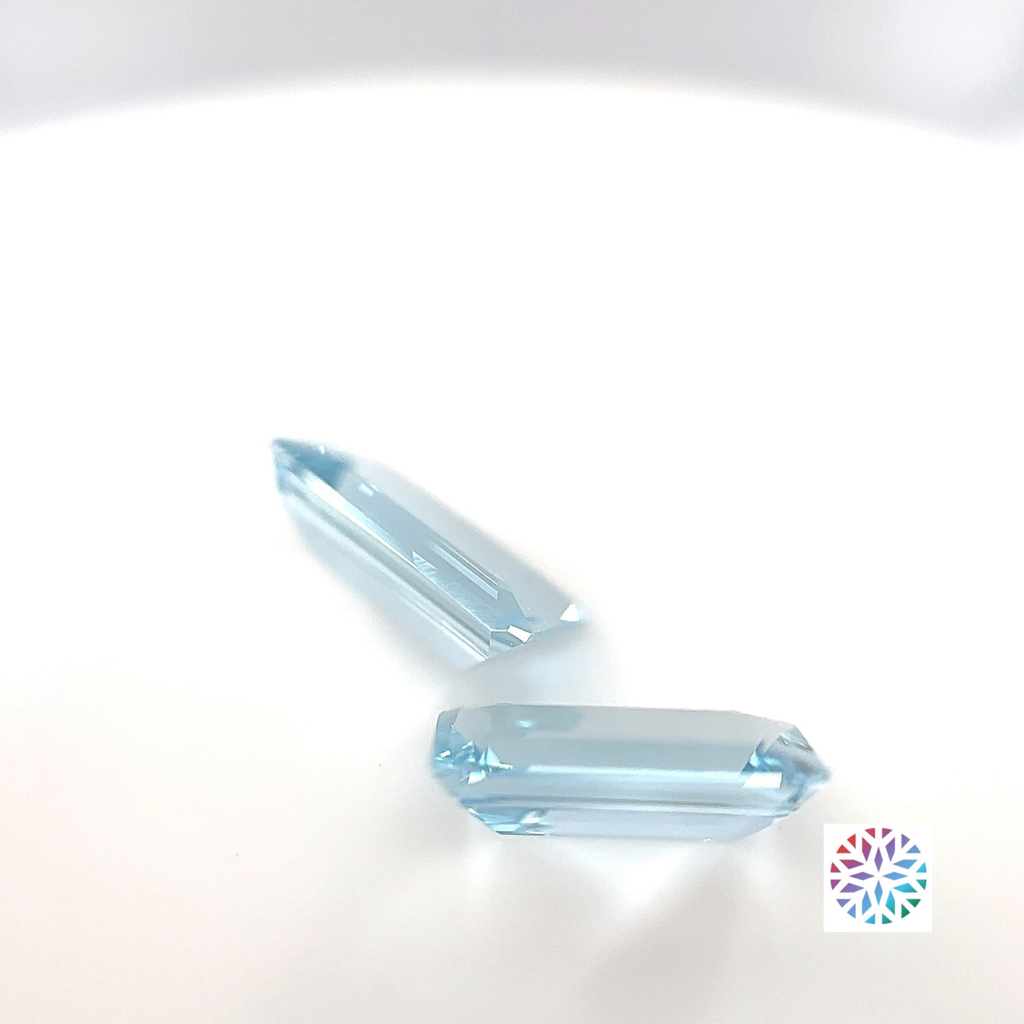 Aquamarine pair - Emerald, 2.55ct, 9.6 x 6.0mm