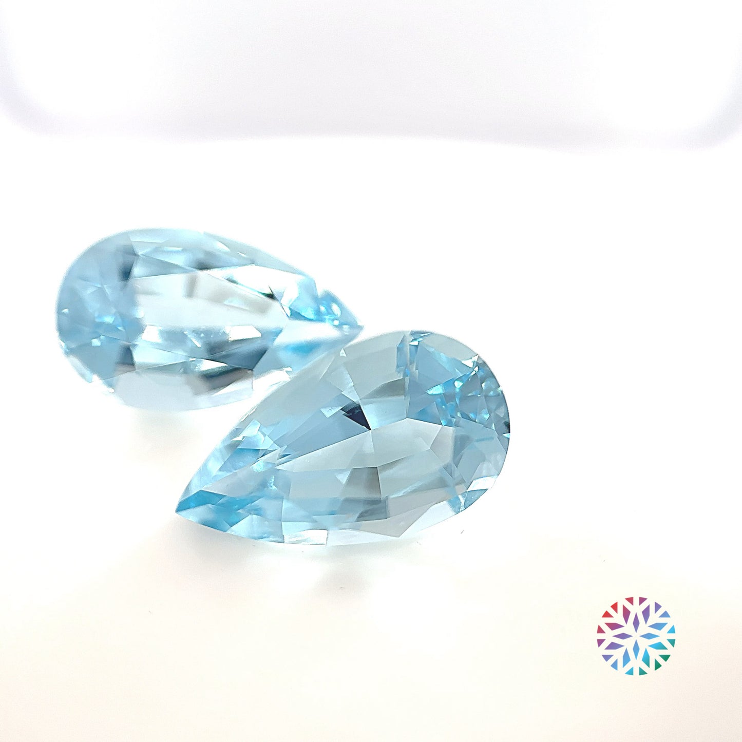 Aquamarine pair - Pear, 7.93ct, 14.7 x 8.6mm