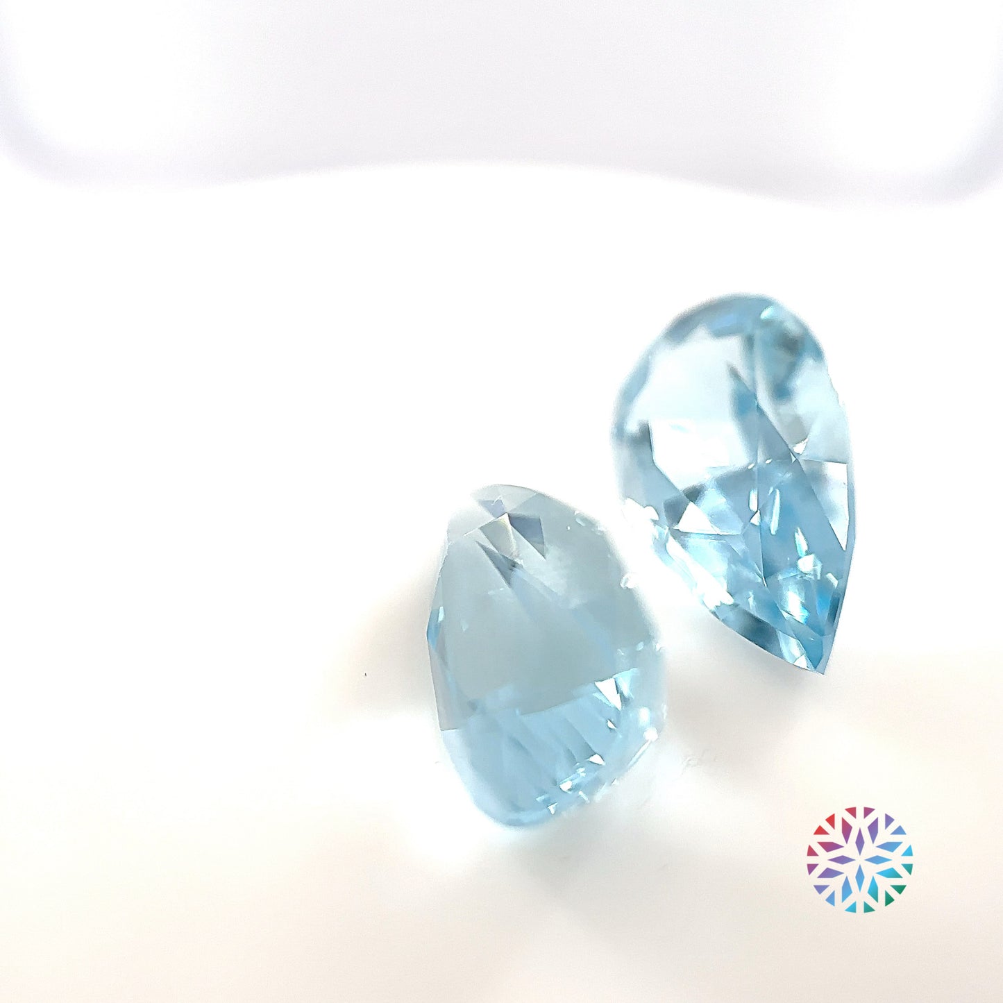 Aquamarine pair - Pear, 7.93ct, 14.7 x 8.6mm
