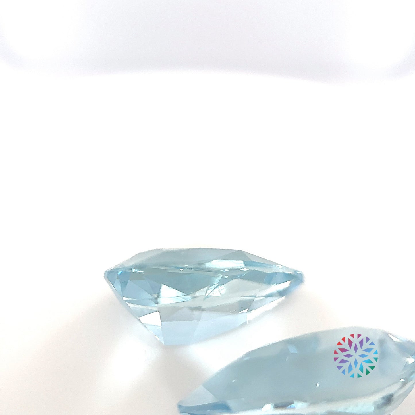 Aquamarine pair - Pear, 7.93ct, 14.7 x 8.6mm