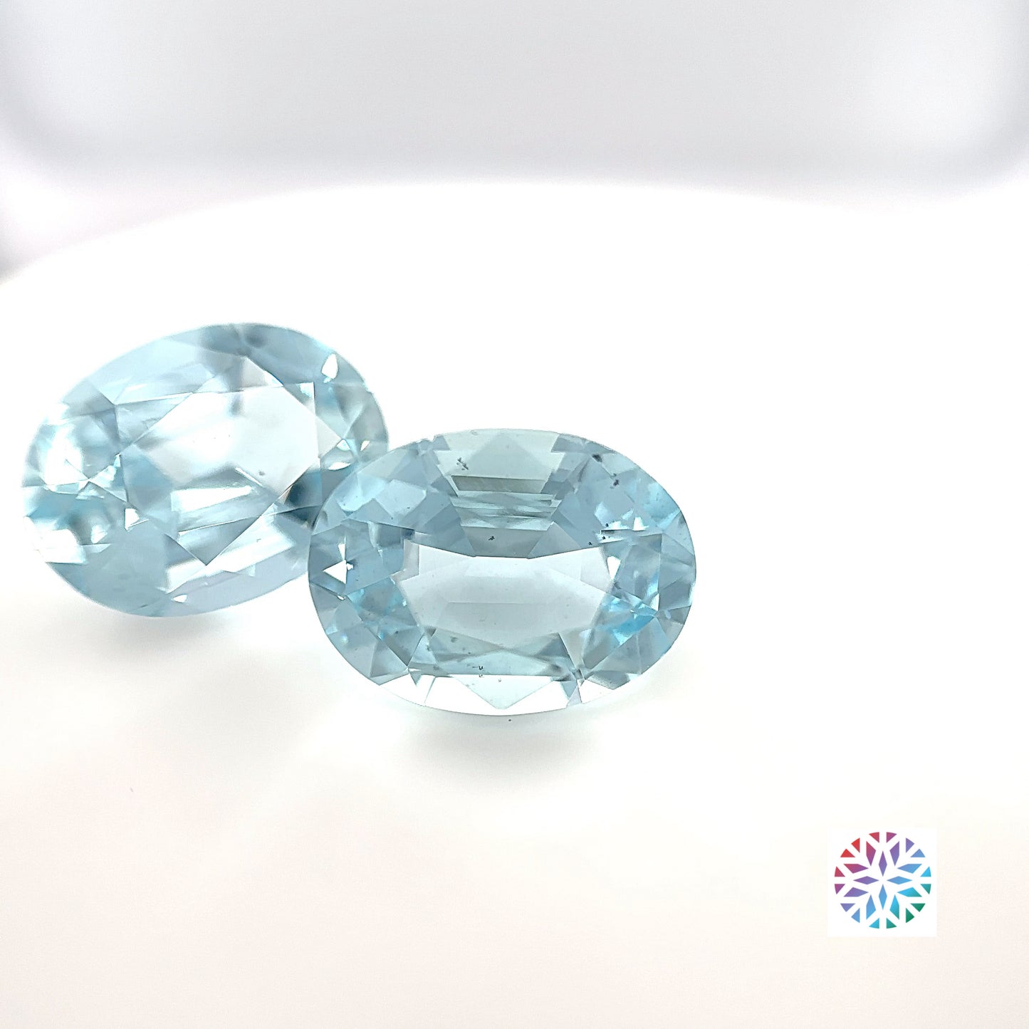 Aquamarine pair - Oval, 7.88ct, 12.5 x 9.4mm