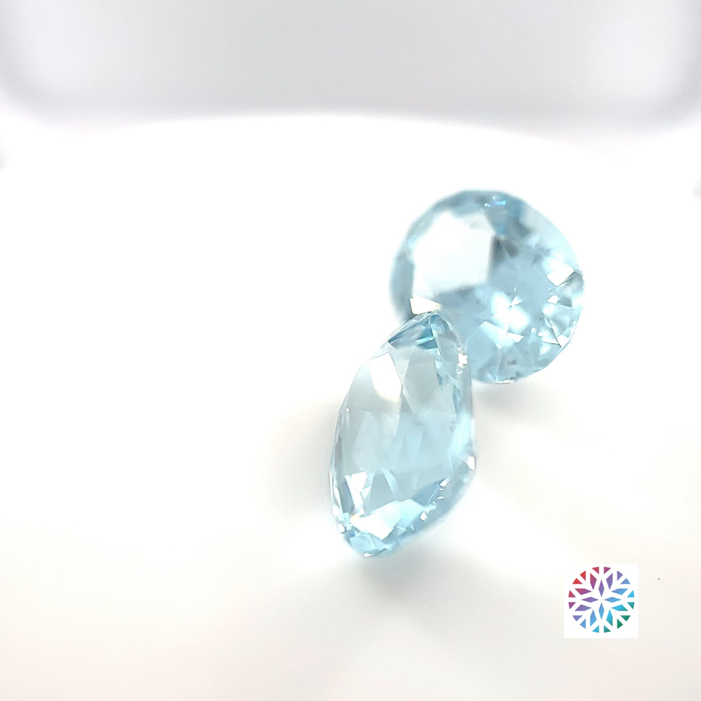 Aquamarine pair - Oval, 7.88ct, 12.5 x 9.4mm