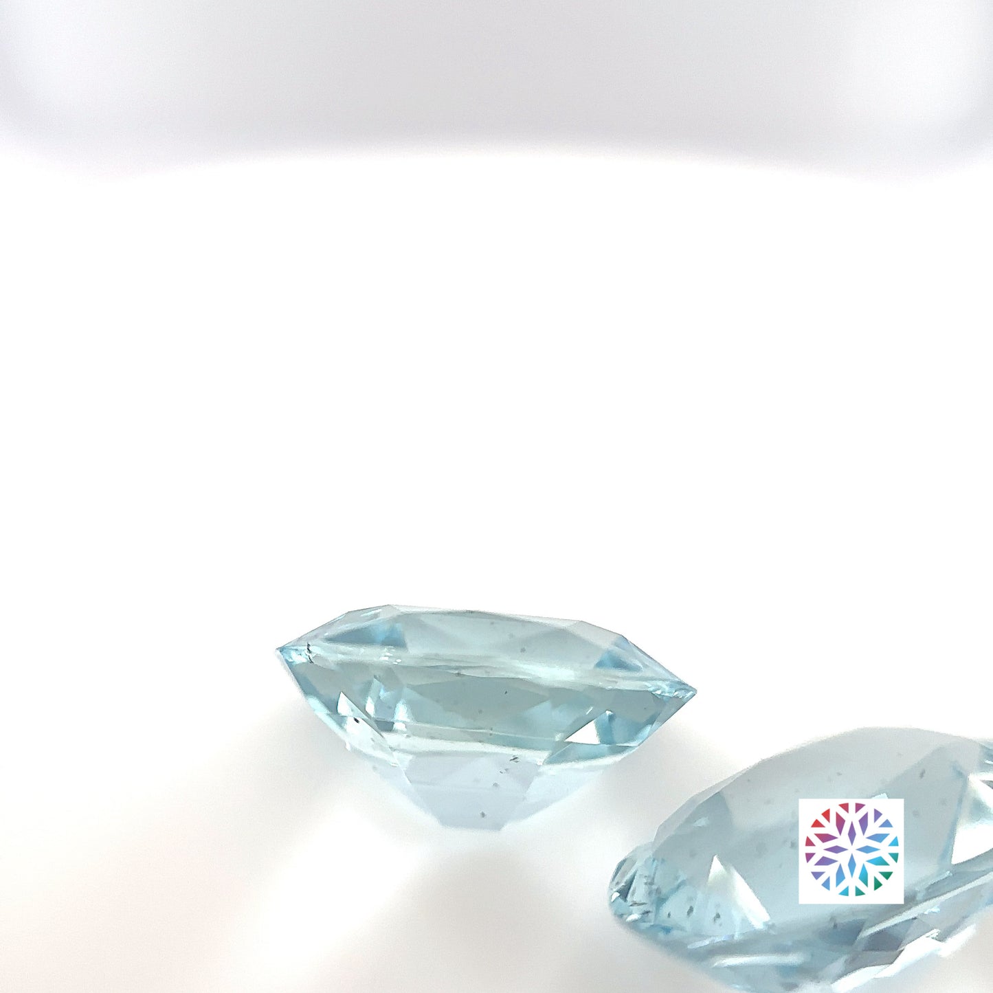 Aquamarine pair - Oval, 7.88ct, 12.5 x 9.4mm