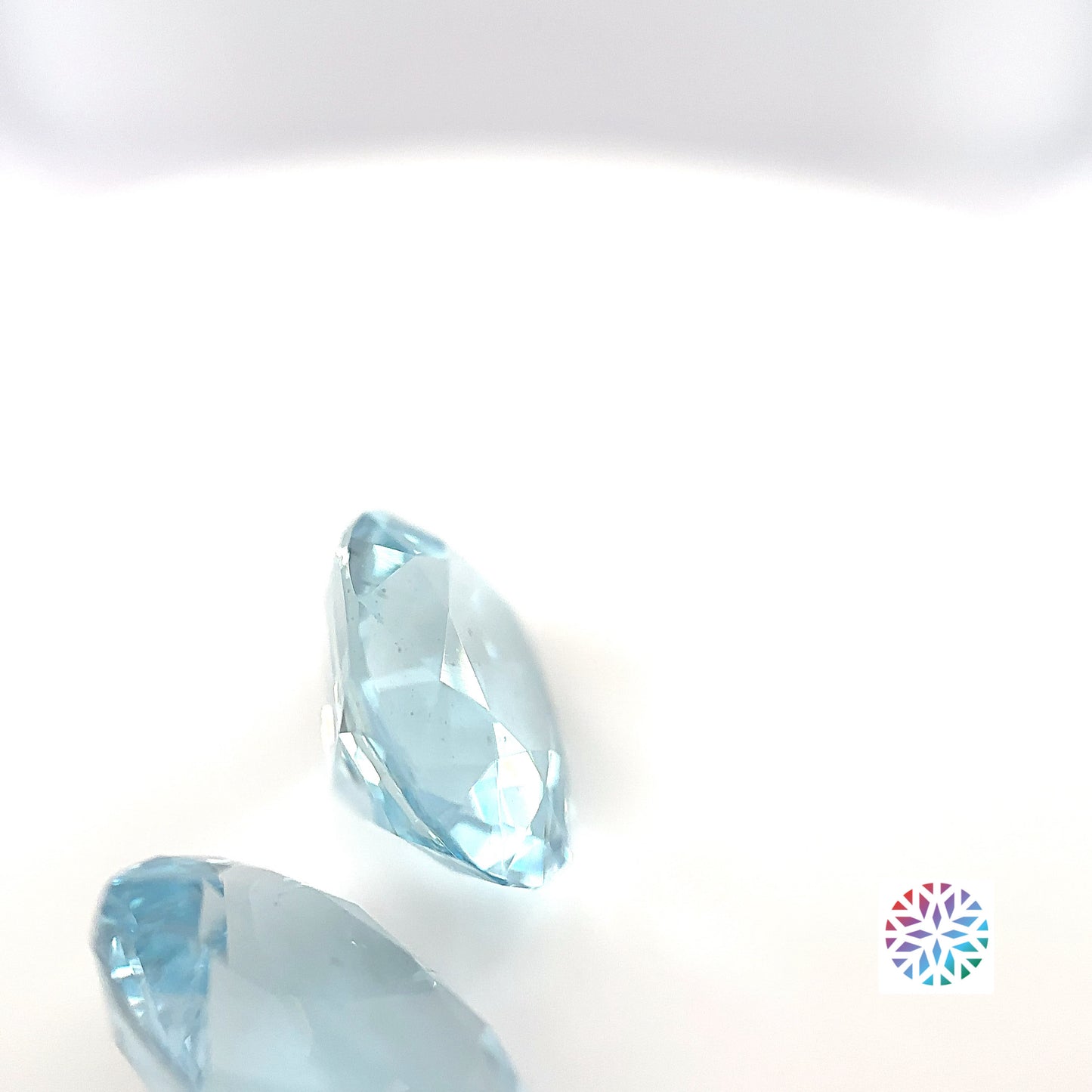 Aquamarine pair - Oval, 7.88ct, 12.5 x 9.4mm