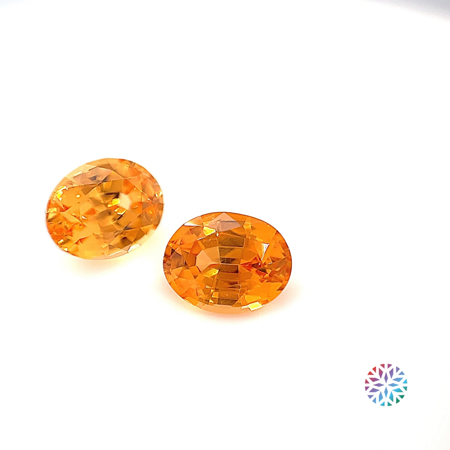 Mandarin Garnet pair - Oval, 2.55ct, 6.9 x 5.5mm