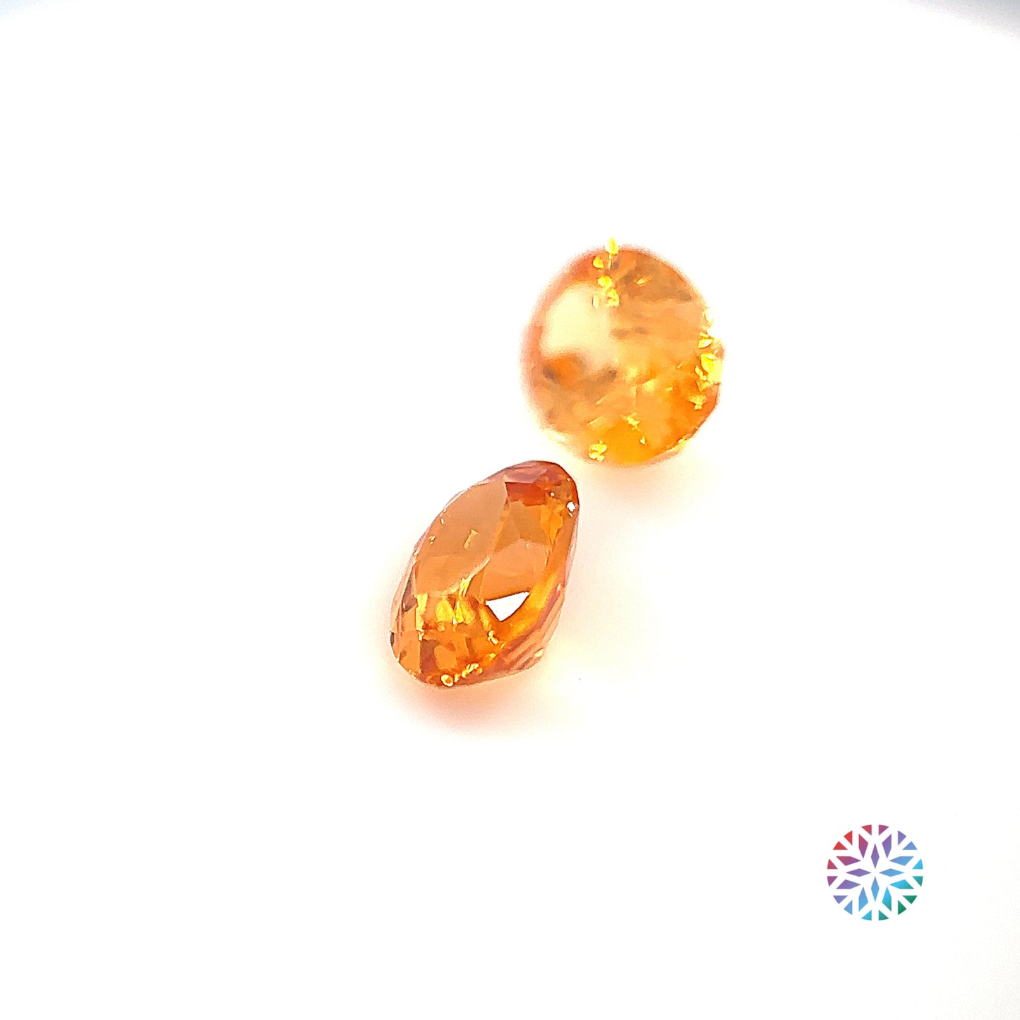 Mandarin Garnet pair - Oval, 2.55ct, 6.9 x 5.5mm