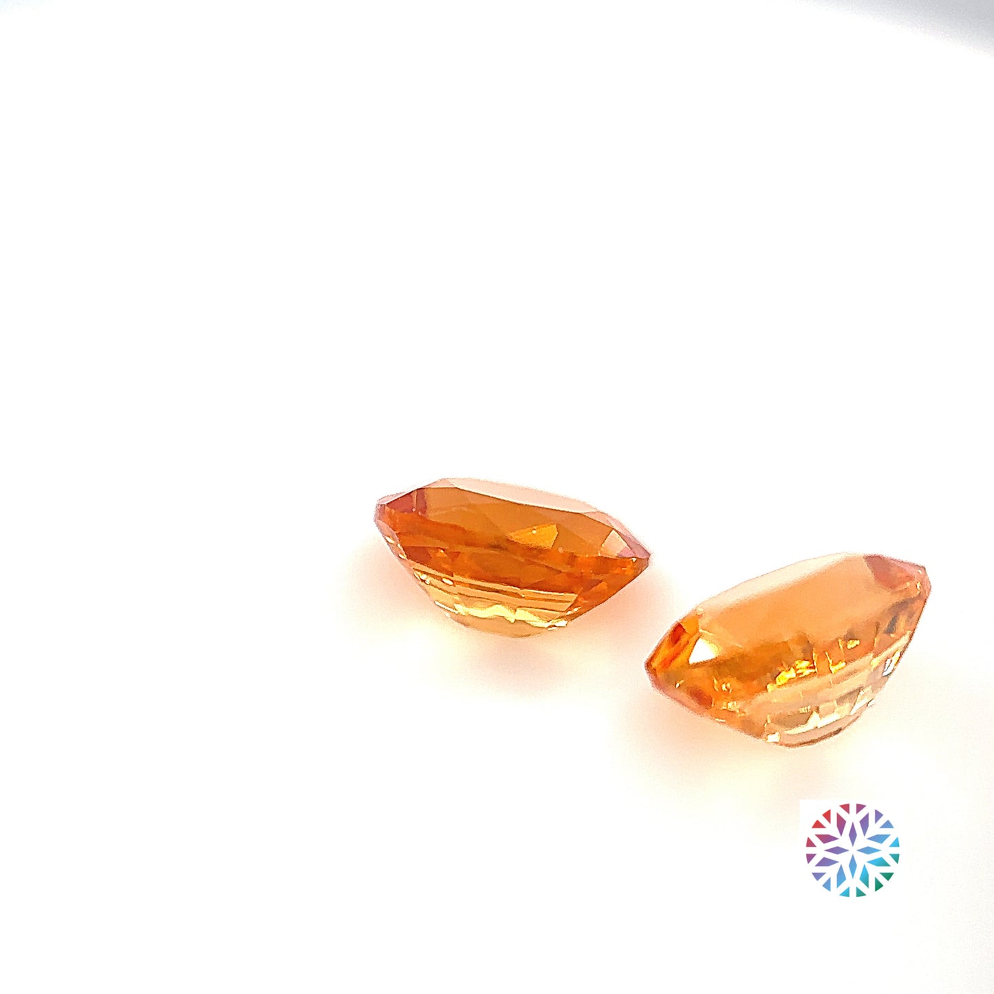 Mandarin Garnet pair - Oval, 2.55ct, 6.9 x 5.5mm