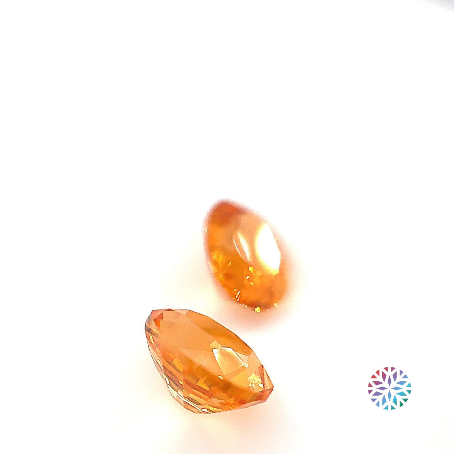 Mandarin Garnet pair - Oval, 2.55ct, 6.9 x 5.5mm